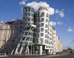 22 Jun 2005, Prague, Czech Republic --- The Rasin Building, the official name for what has become known as the Fred and Ginger Building, was designed by Frank O. Gehry and Czech co-architect Vladimir Milunic. --- Image by © Paul Seheult/Eye Ubiquitous/Corbis