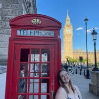 This image is me, standing alongside a red London telephone booth with Big Ben in the background.