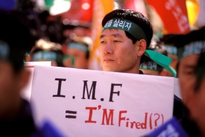 Office workers protesting against the International Monetary Fund (IMF) during the Korean economic crisis.