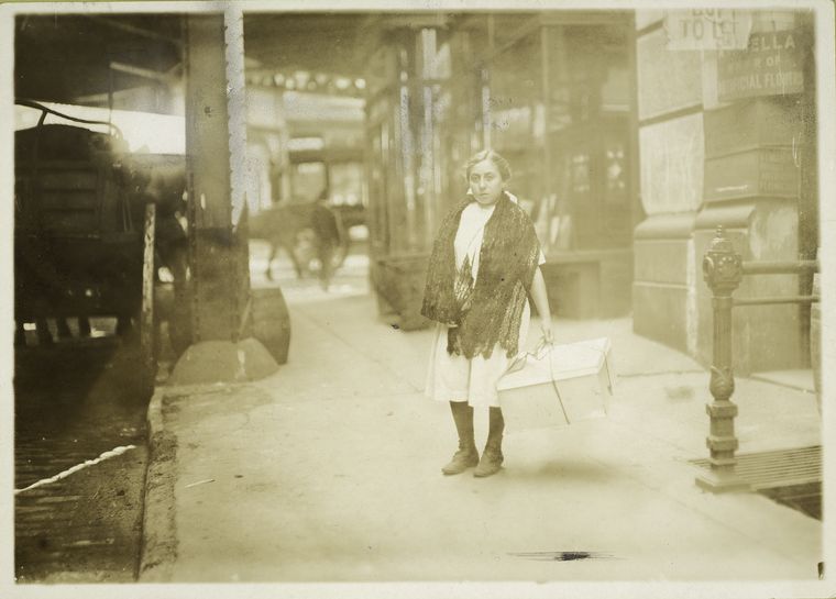 The Miriam and Ira D. Wallach Division of Art, Prints and Photographs: Photography Collection, The New York Public Library. "A young girl on West 3rd Street delivering flowers made at home during school hours" The New York Public Library Digital Collections. 1907 - 1933. http://digitalcollections.nypl.org/items/510d47d9-4e05-a3d9-e040-e00a18064a99