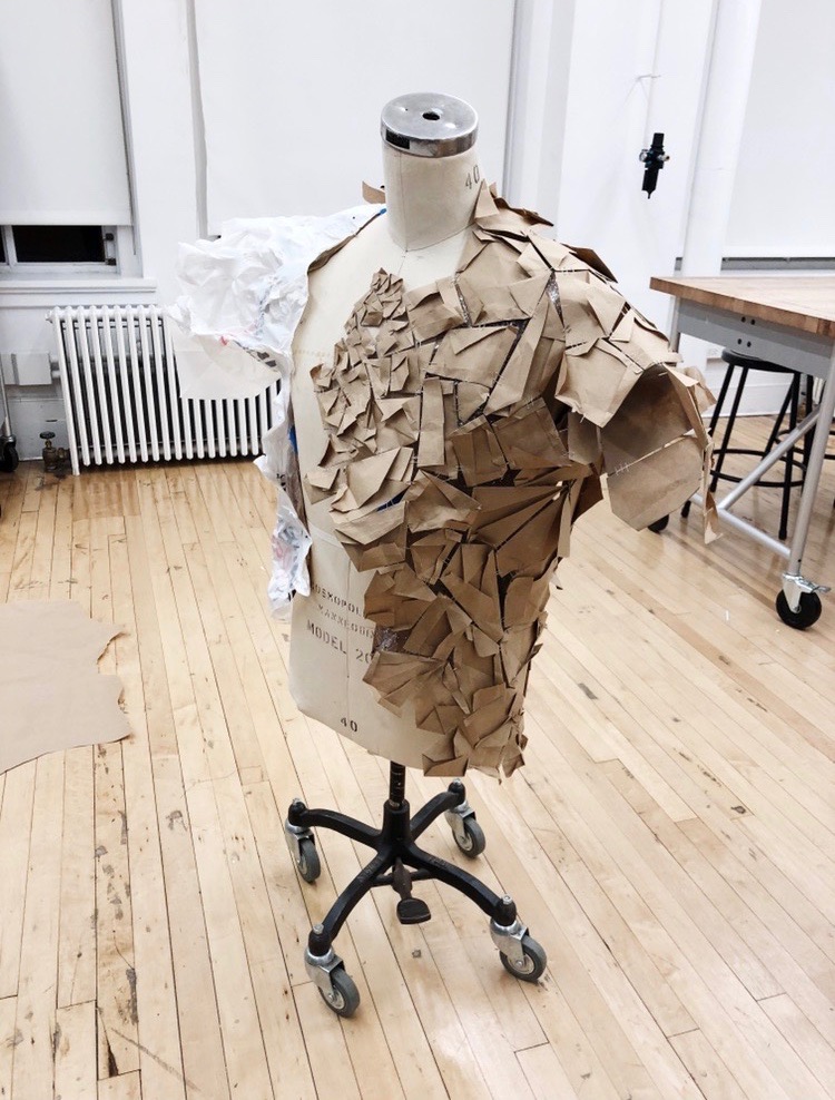 The process of making the jacket out of trash.