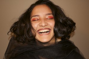 The stereotype that all of us have heard before… Asians cannot see with their small eyes because they do not have eyelids. This image portrays a woman mocking the ridiculous misconceptions made towards Asians. This photograph is a balance of the real reaction of a woman to society and the fake is having her eyes closed shut. 